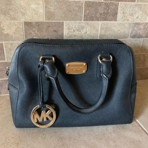 Black authentic MK handbag, in used condition